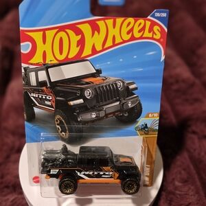 Black and Orange Jeep Toy Car